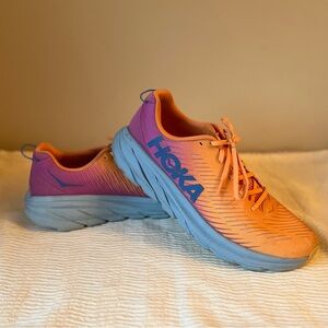 Hoka Vibrant Orange and Purple Sneakers